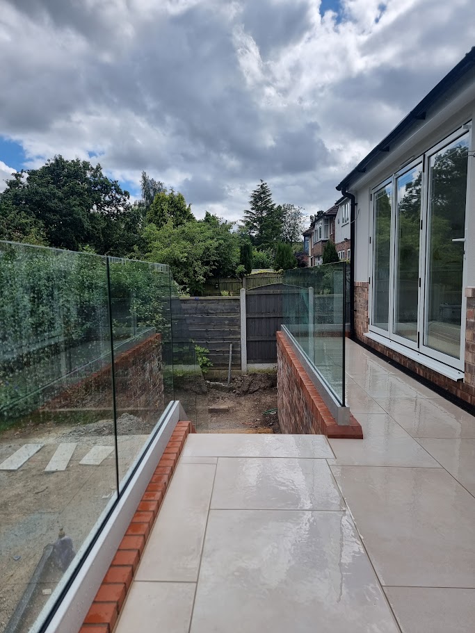 Frameless glass on a raised terrace in Bramhall — further view of the completed installation