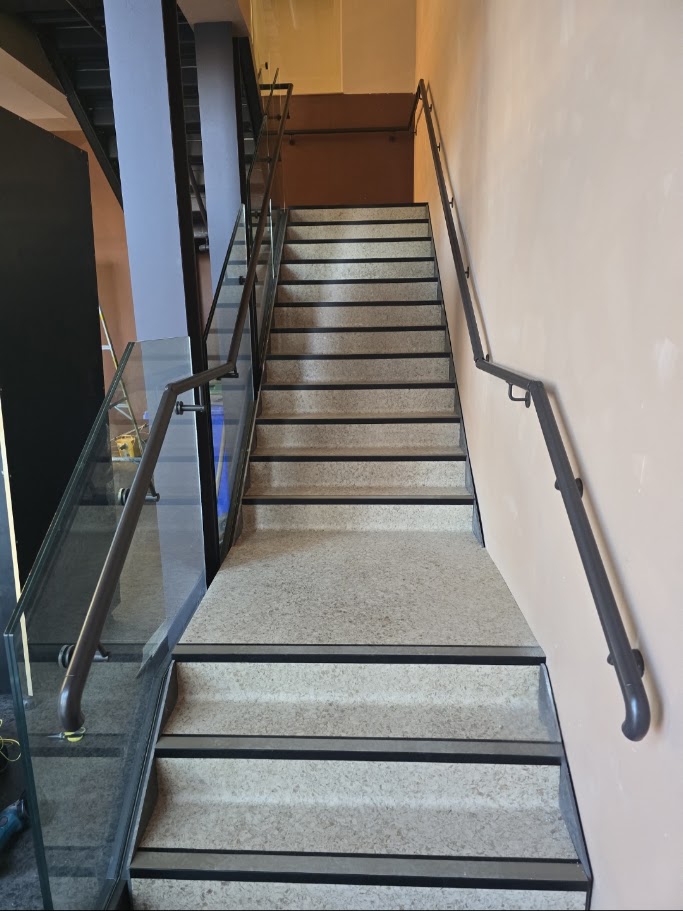 Frameless glass mezzanine and stair balustrades — further view of the completed installation