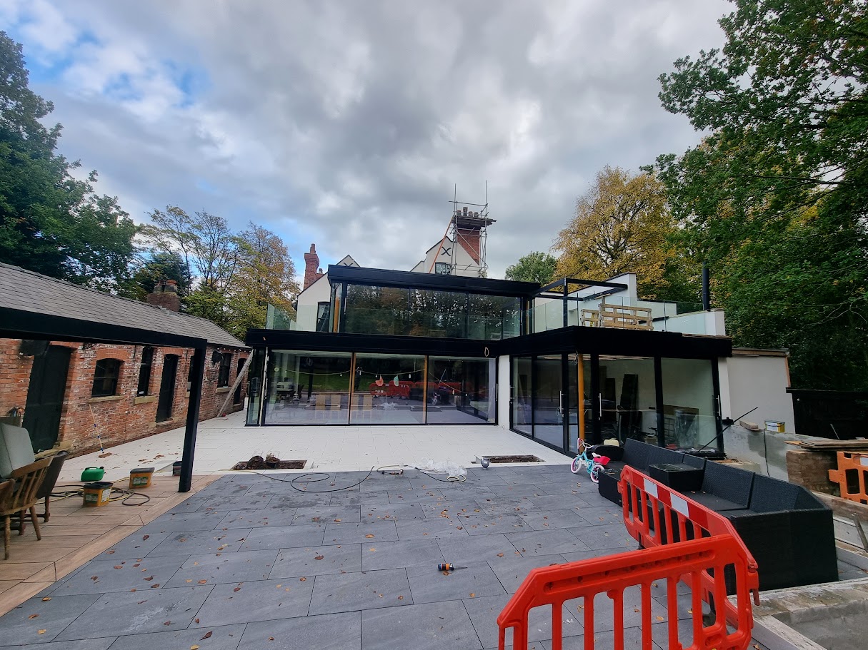 Frameless glass terraces on a Victorian villa extension — Manchester Balustrades installation