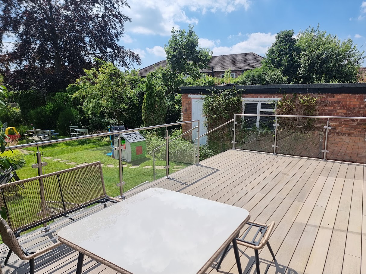 A stainless post glass balustrade on a Hale garden deck — further view of the completed installation