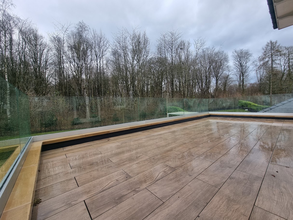 A frameless glass roof terrace in Nether Alderley — further view of the completed installation
