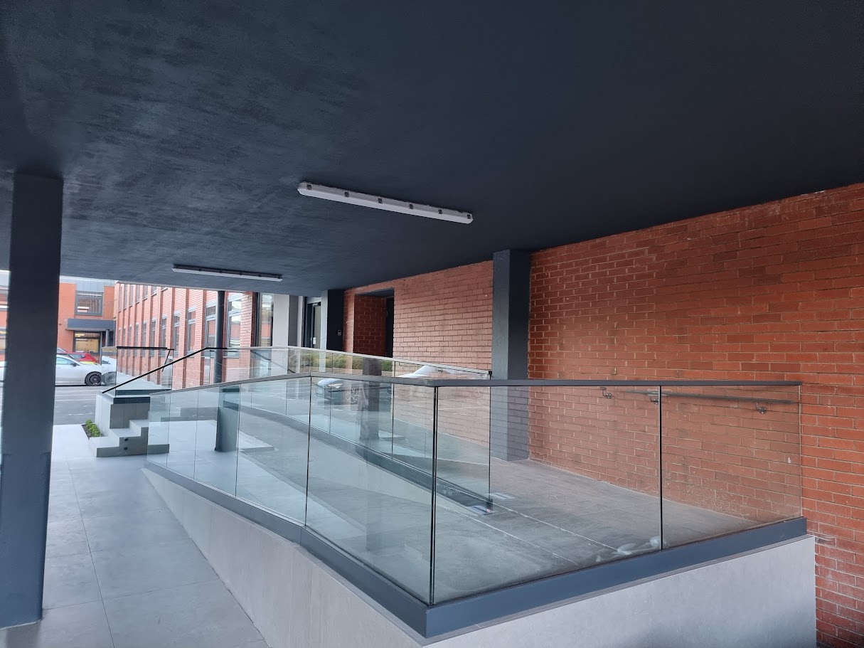 Glass balustrading at the Two Four Nine development, Altrincham — further view of the completed installation
