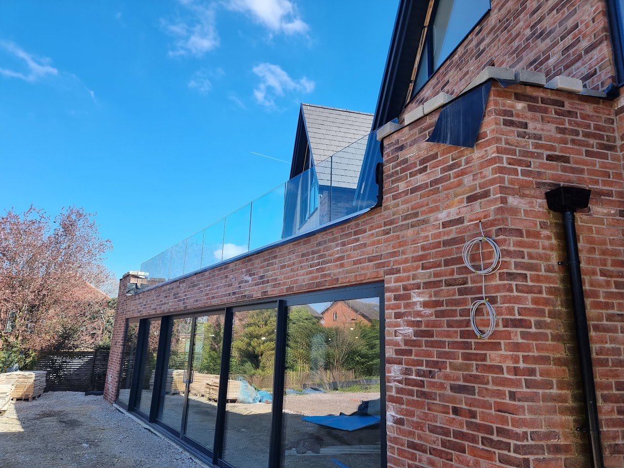 A frameless glass roof terrace in Woodford — further view of the completed installation
