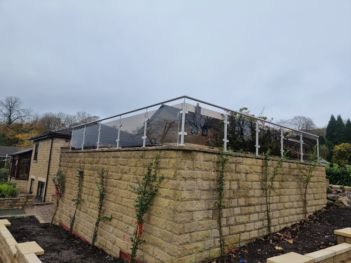 Bronze glass balustrades on stone terraces in Buxton — Manchester Balustrades installation