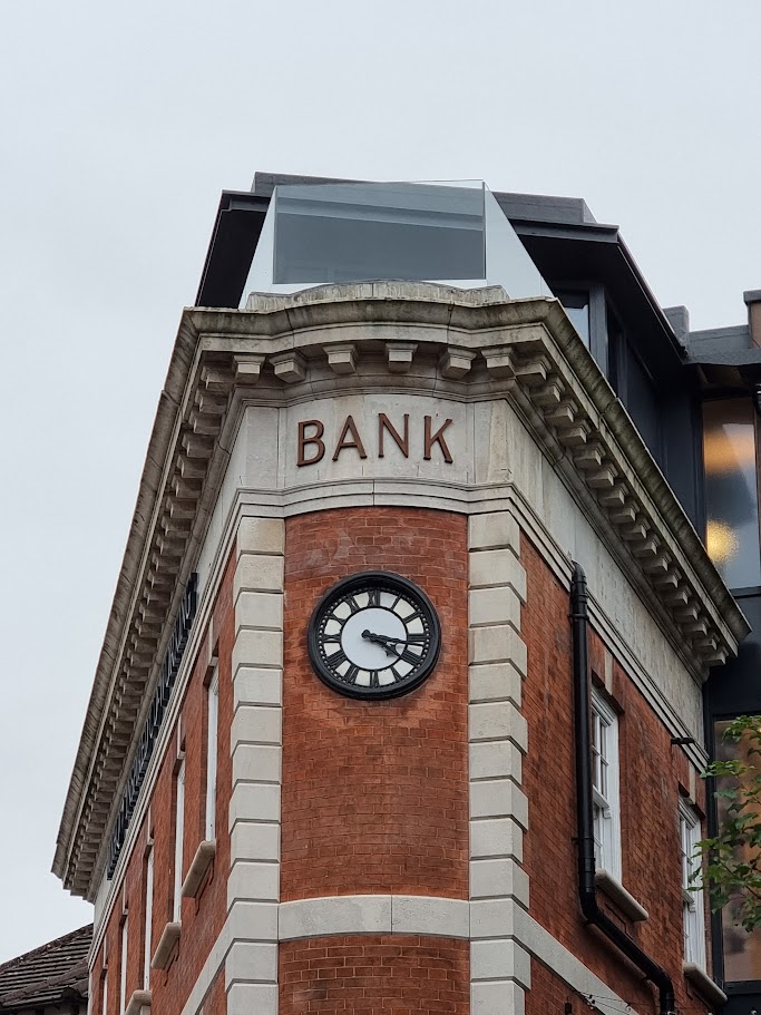 A rooftop terrace above a converted bank — further view of the completed installation