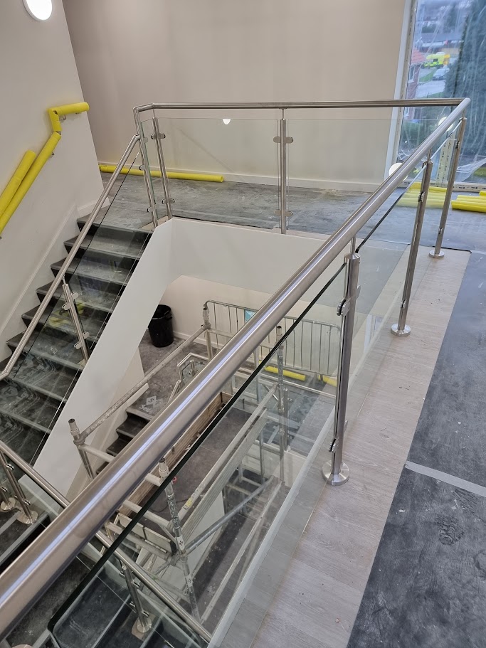 Glass balustrades for a commercial stair and landing — further view of the completed installation