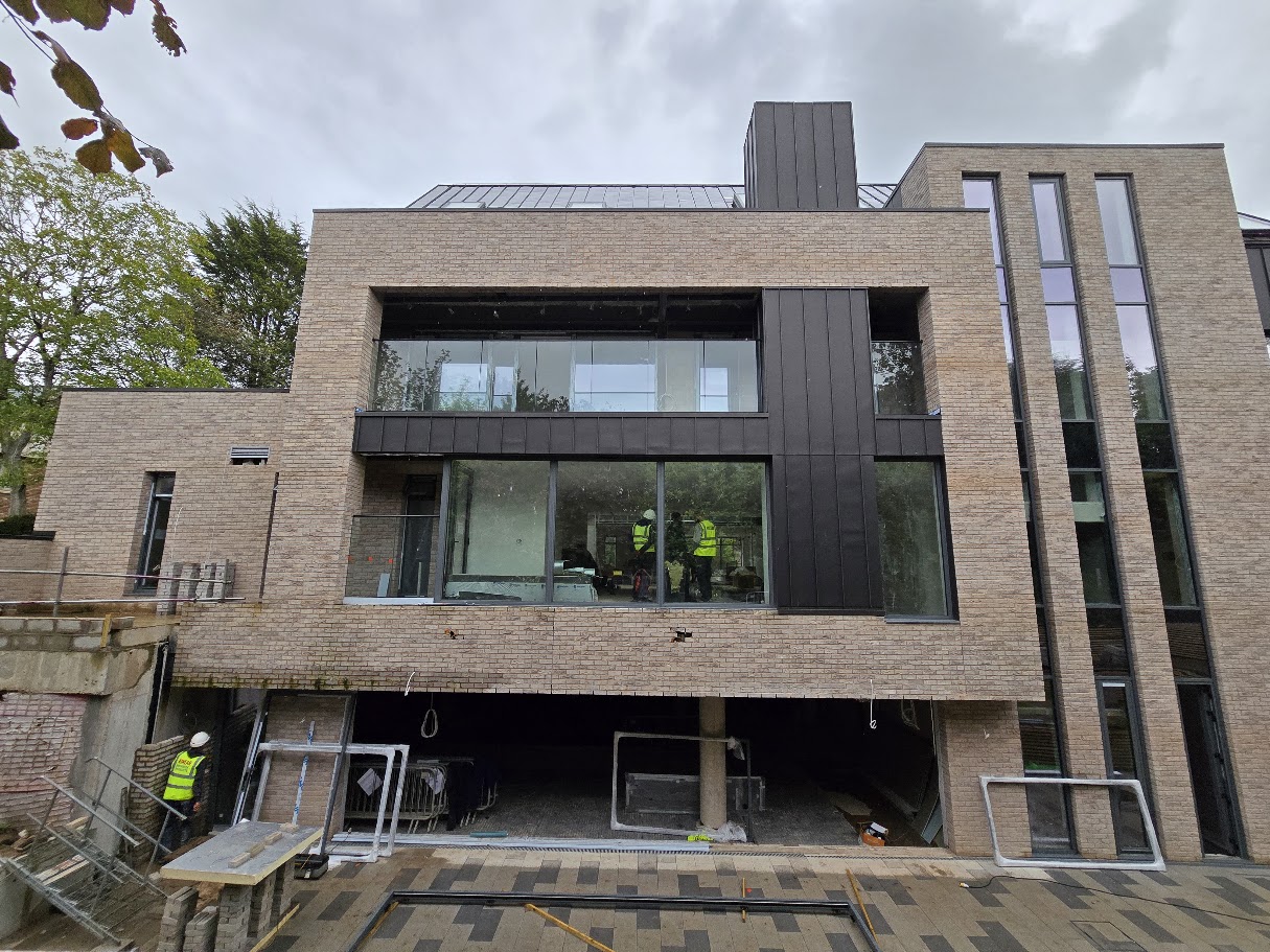 Frameless glass balcony on a new-build home — Manchester Balustrades installation