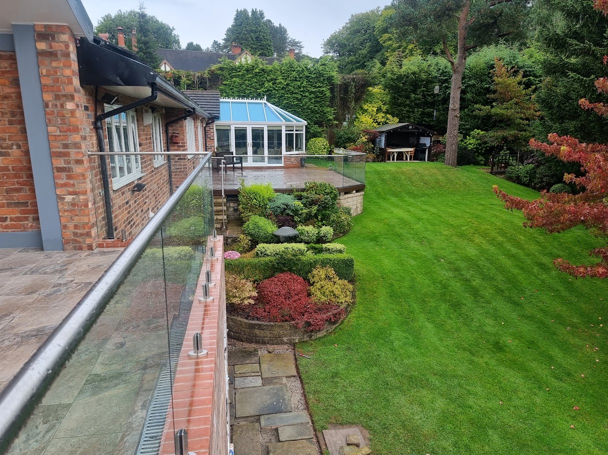 Stand-off glass on a brick terrace in Disley — Manchester Balustrades installation