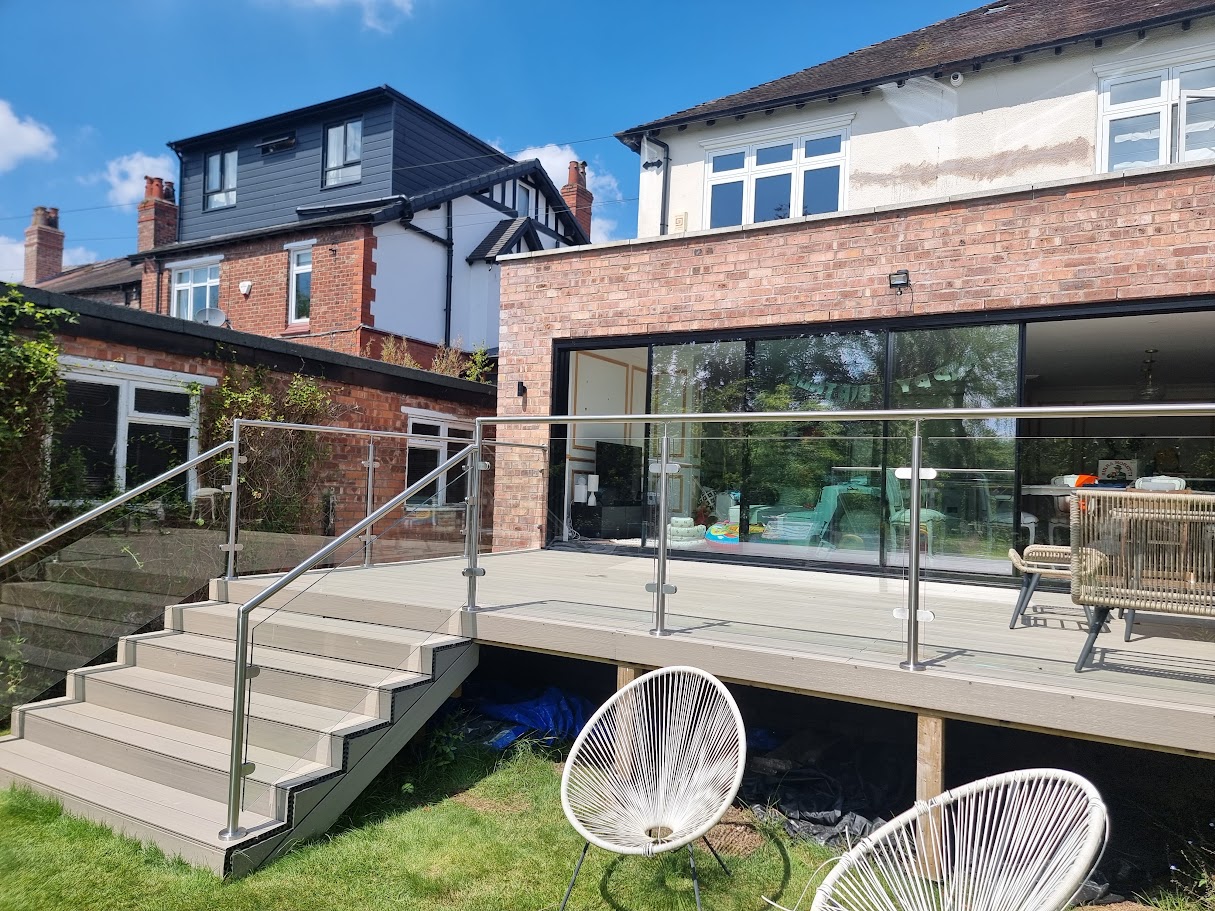 A stainless post glass balustrade on a Hale garden deck — further view of the completed installation