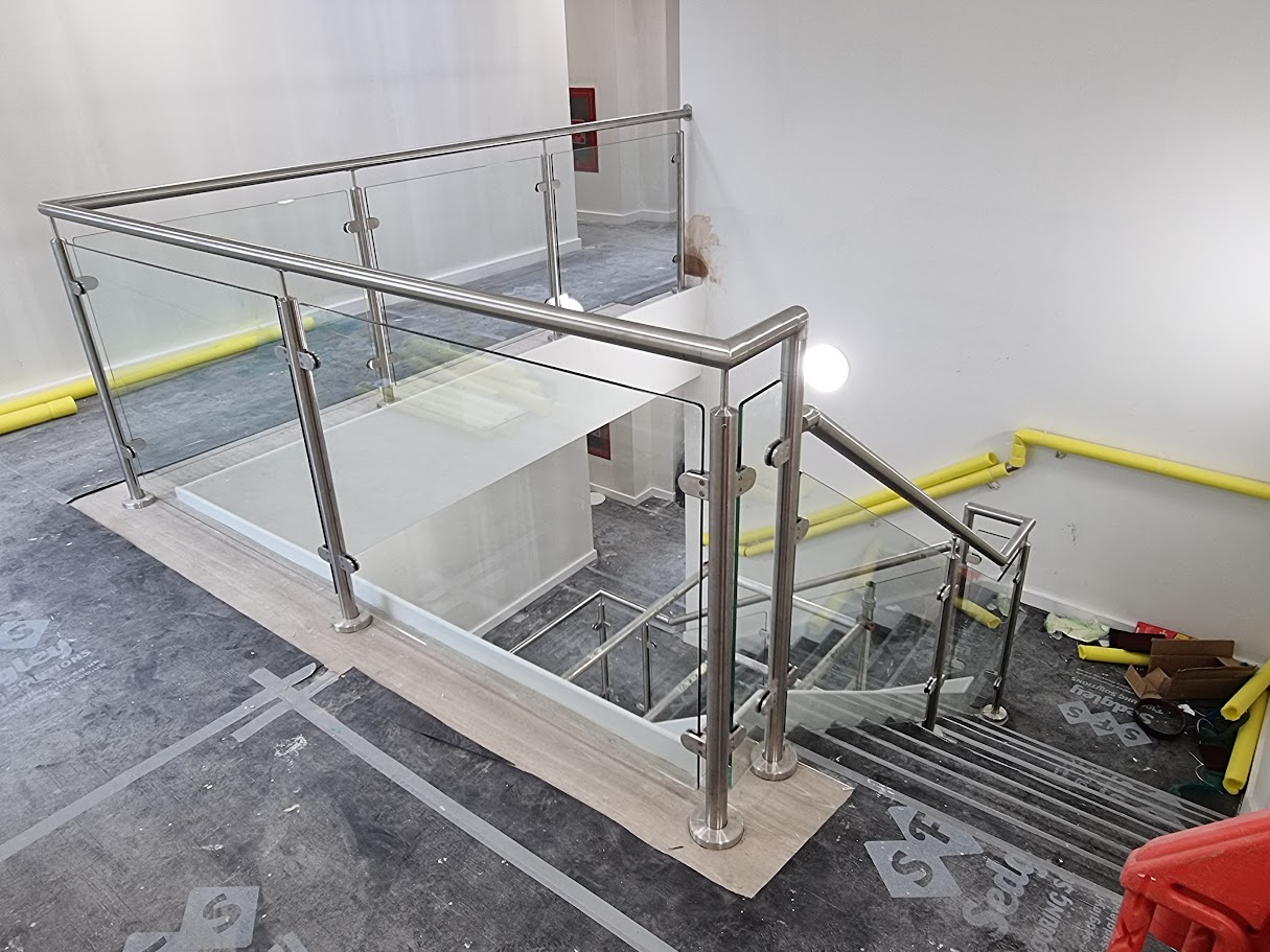 Glass balustrades for a commercial stair and landing — further view of the completed installation