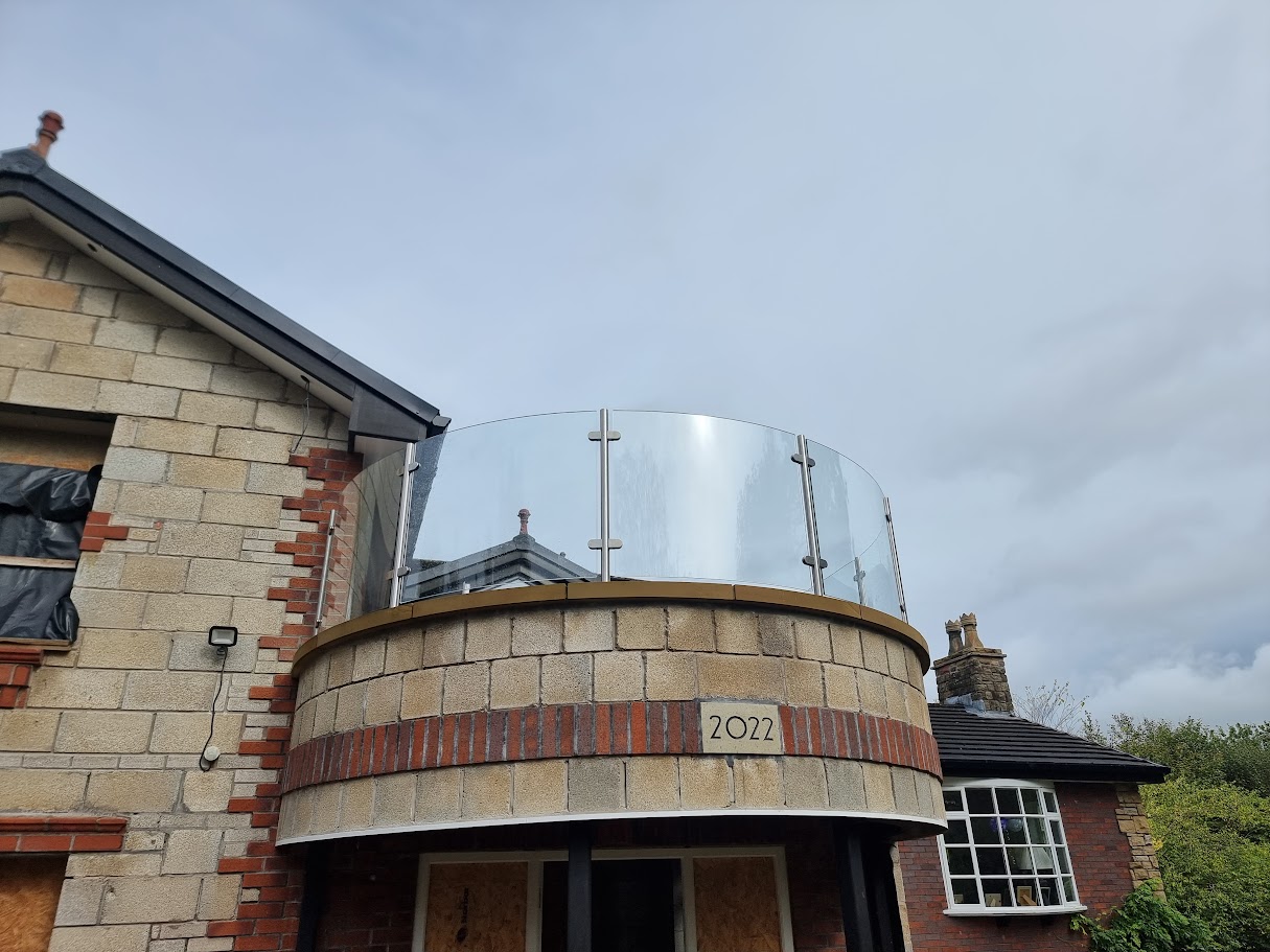 A curved glass balcony in Marple Bridge — further view of the completed installation