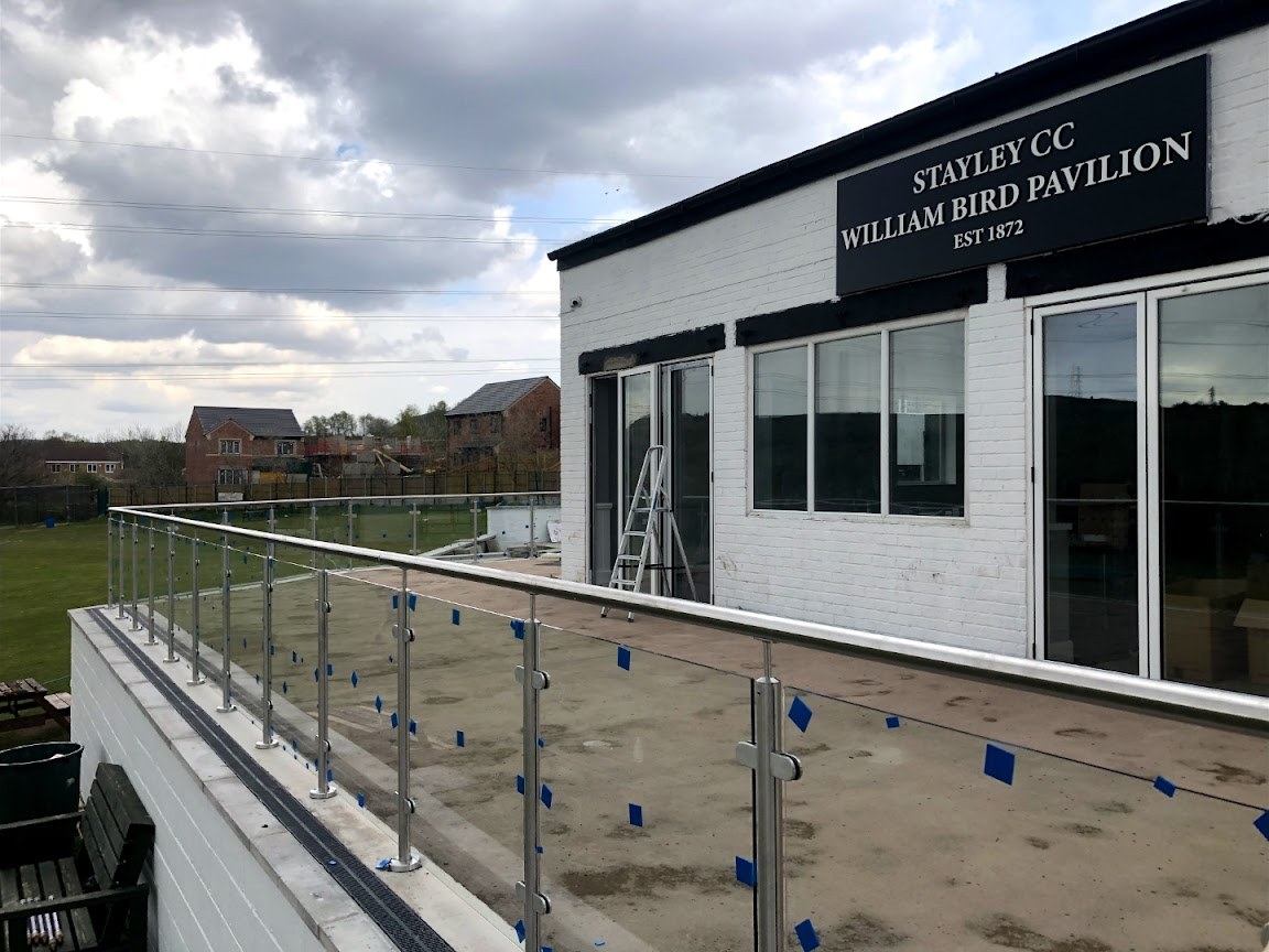 Post-and-glass balustrades at Stayley Cricket Club — Manchester Balustrades installation