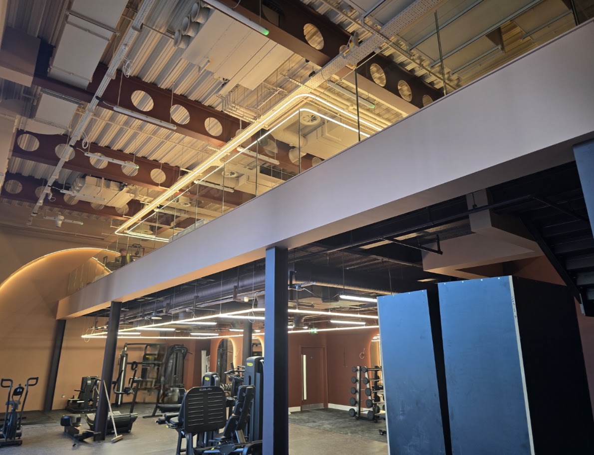 Frameless glass mezzanine and stair balustrades — further view of the completed installation