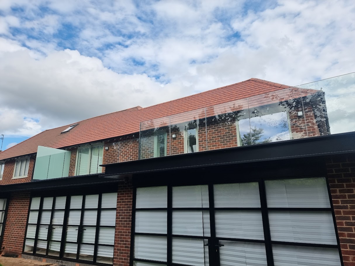 A frameless glass roof terrace in Wilmslow — Manchester Balustrades installation
