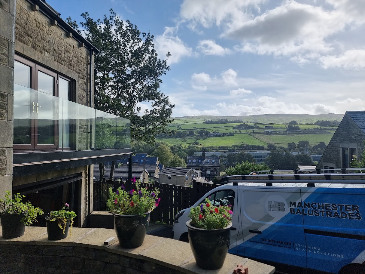 A frameless glass balcony in Mossley — further view of the completed installation