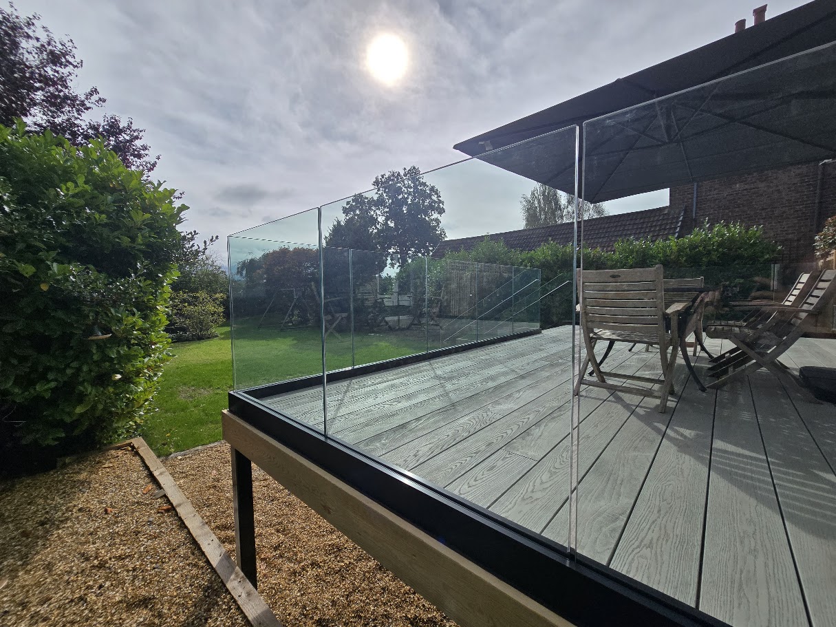 Frameless glass on a raised terrace in Bramhall — further view of the completed installation