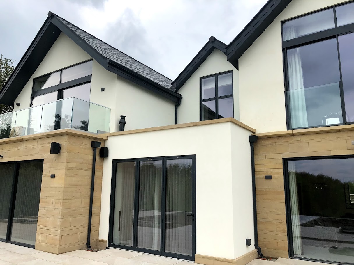 A frameless balcony on a Mottram St Andrew new build — further view of the completed installation
