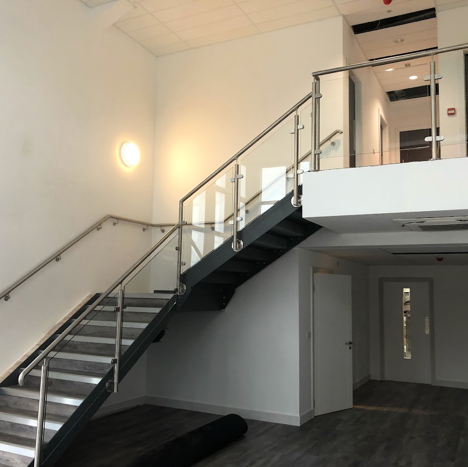 Glass balustrades for a commercial stair and landing — further view of the completed installation