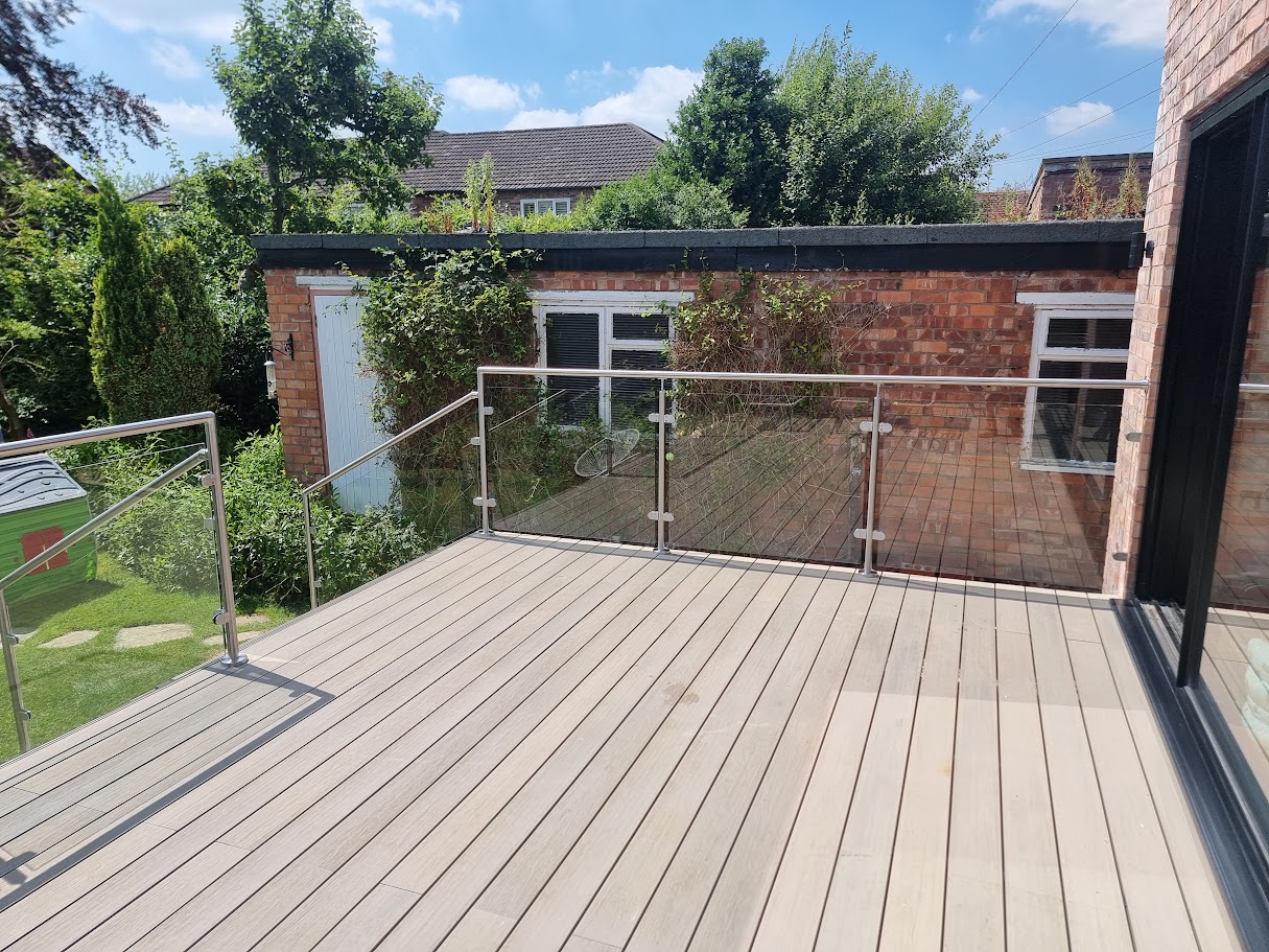 A stainless post glass balustrade on a Hale garden deck — further view of the completed installation