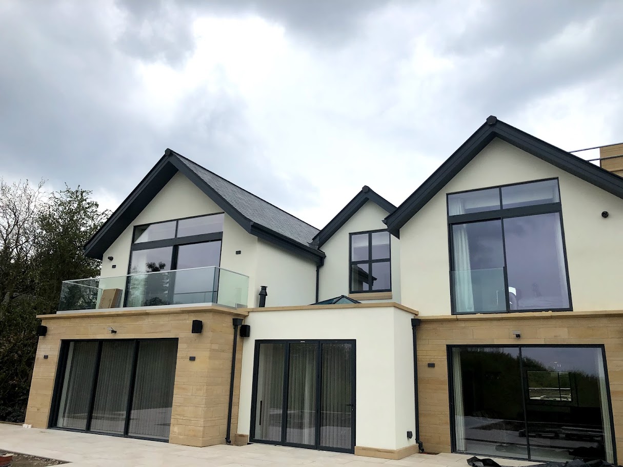 A frameless balcony on a Mottram St Andrew new build — further view of the completed installation