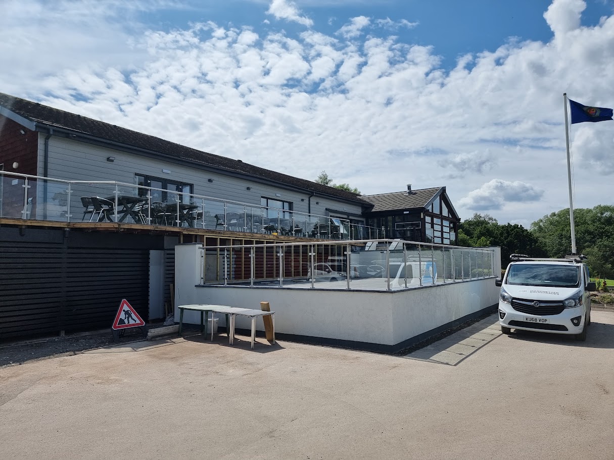 Stainless and glass terraces at Hazel Grove Golf Club — further view of the completed installation