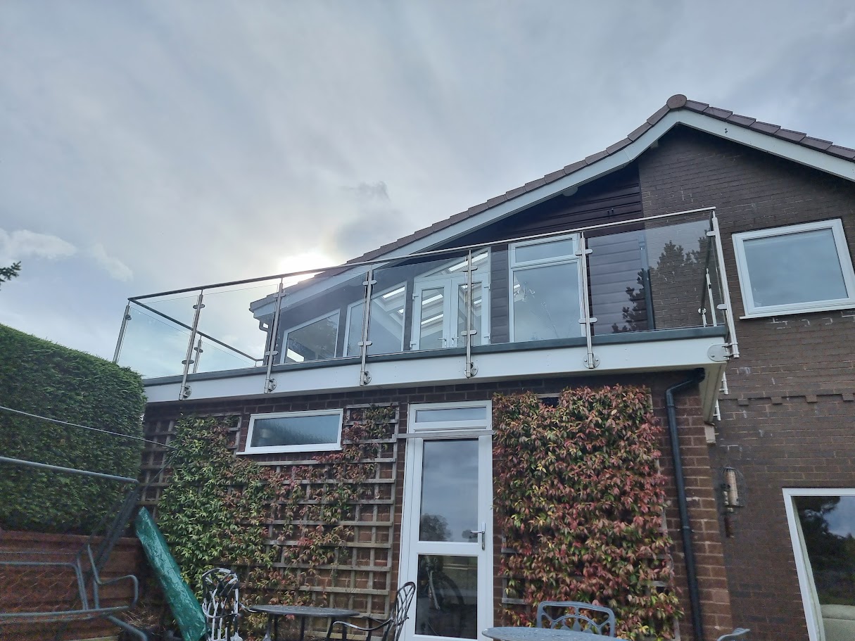 A stainless and glass terrace balustrade in the Peak District — further view of the completed installation