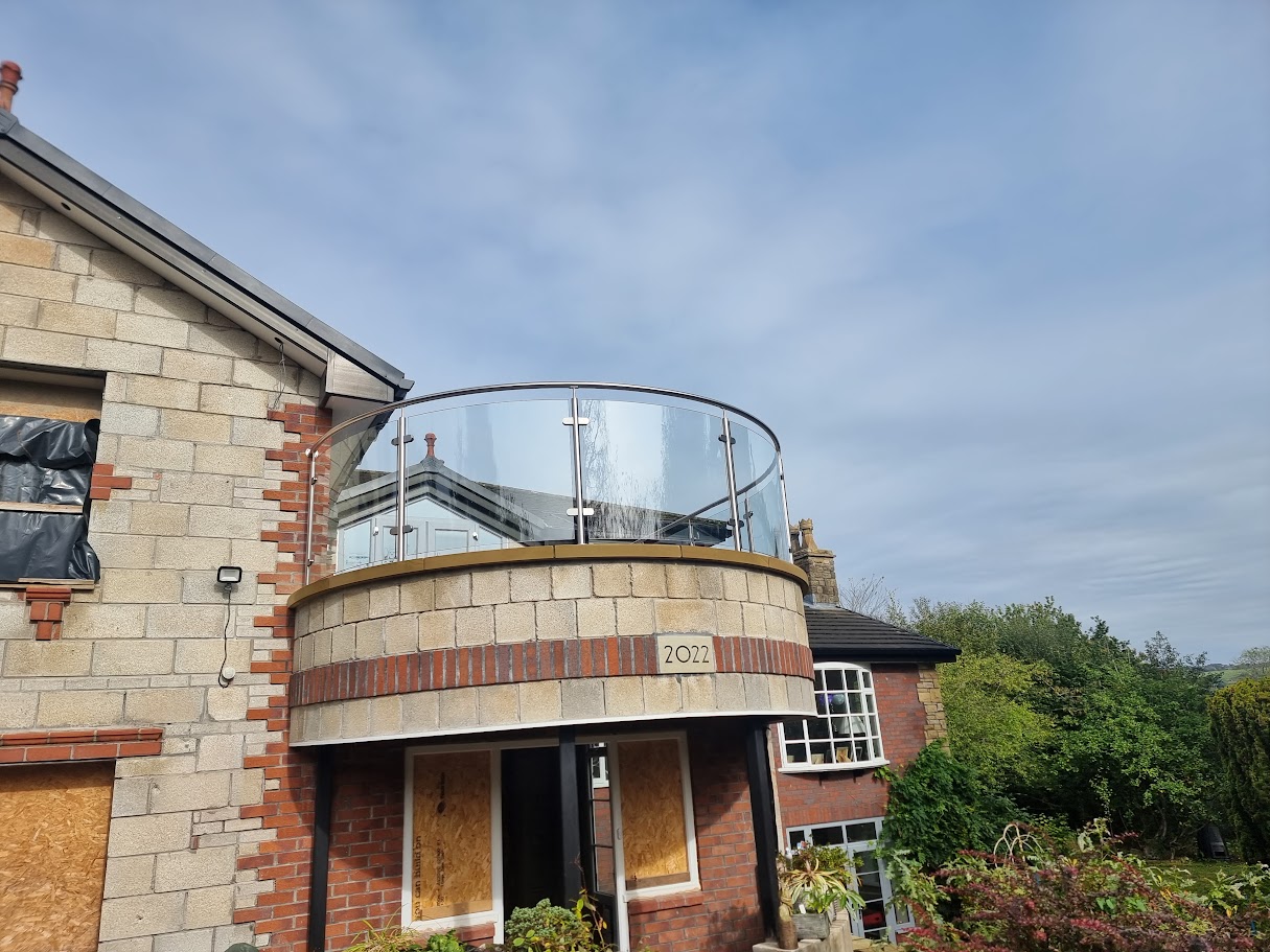 A curved glass balcony in Marple Bridge — further view of the completed installation
