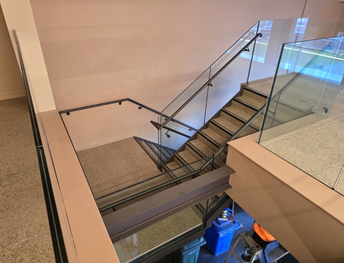 Frameless glass mezzanine and stair balustrades — further view of the completed installation