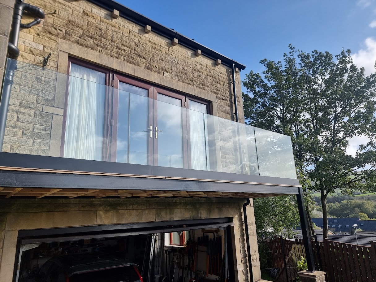 A frameless glass balcony in Mossley — Manchester Balustrades installation