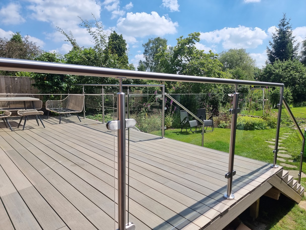 A stainless post glass balustrade on a Hale garden deck — further view of the completed installation