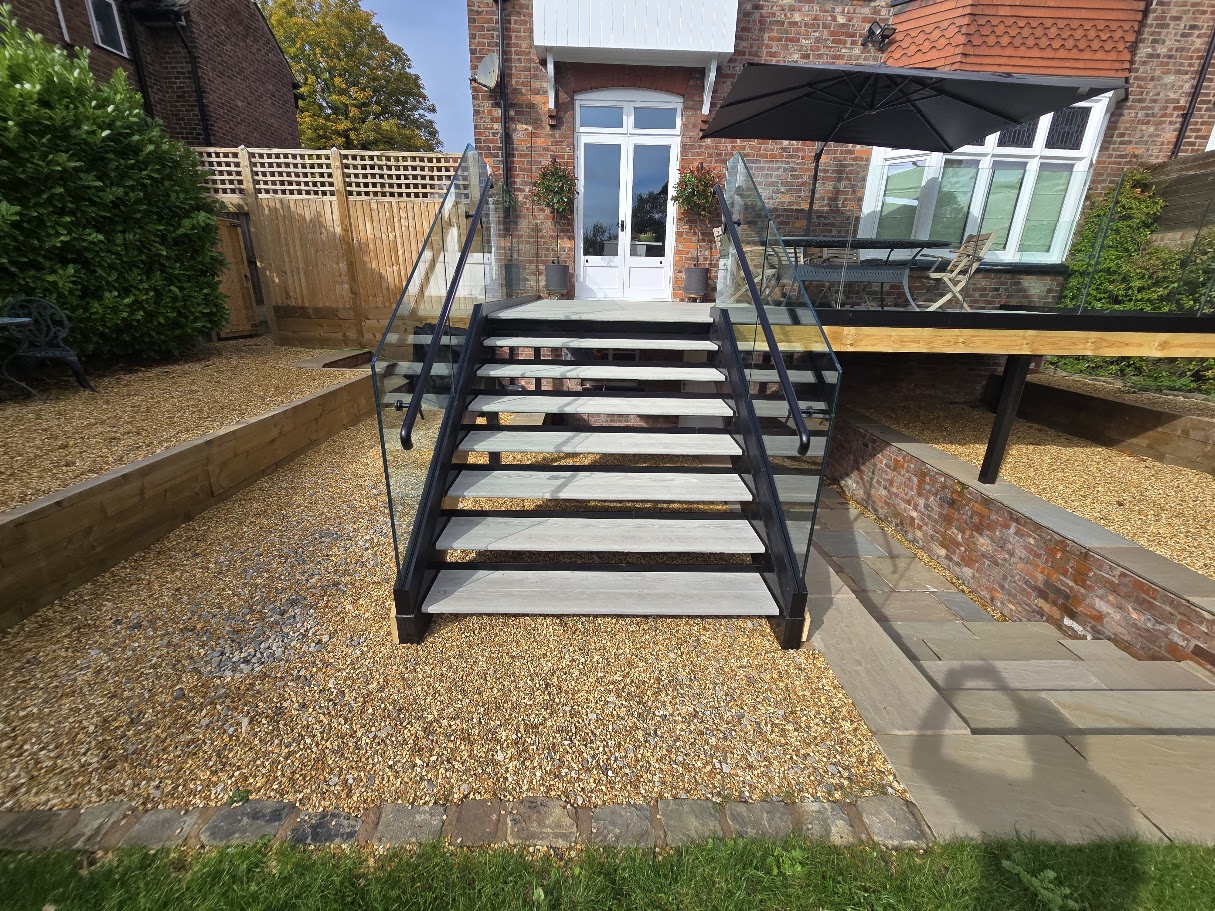 Frameless glass terrace and external staircase — further view of the completed installation