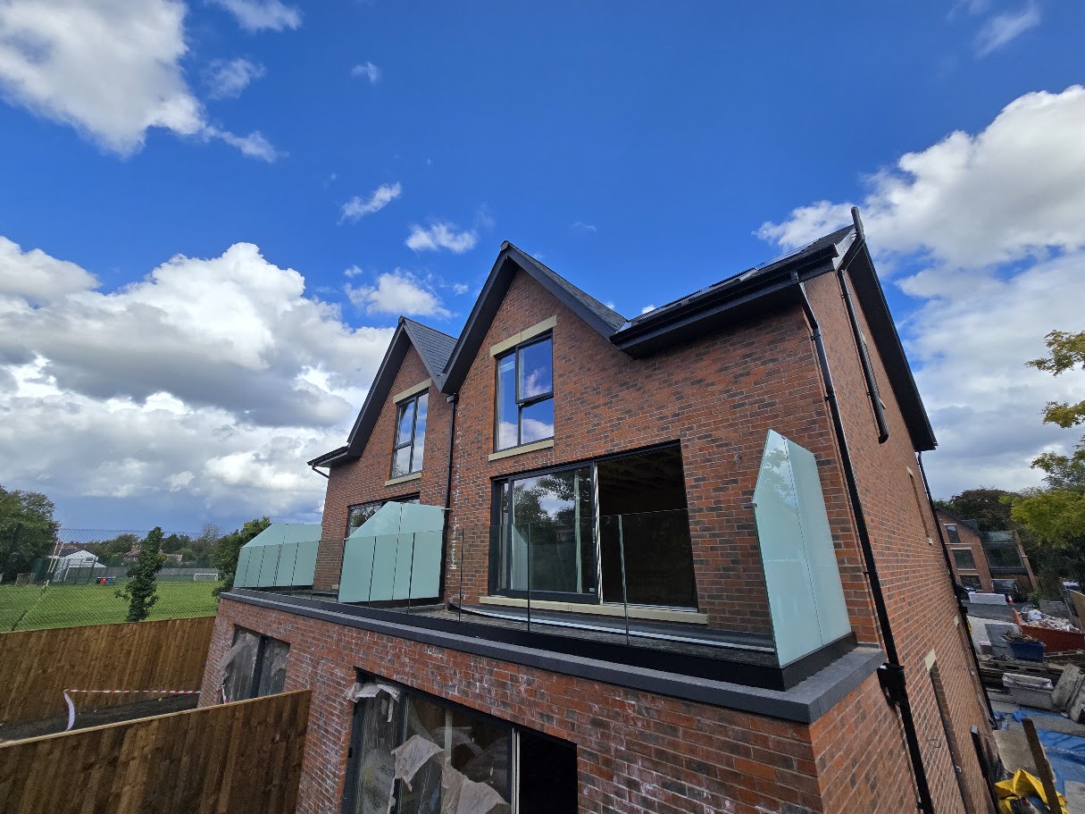 Frameless glass terrace balustrade on a new-build home — further view of the completed installation