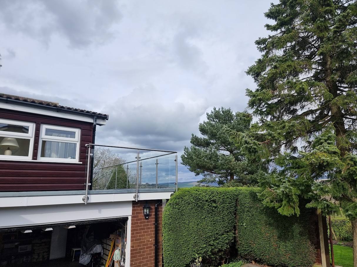 A stainless and glass terrace balustrade in the Peak District — further view of the completed installation