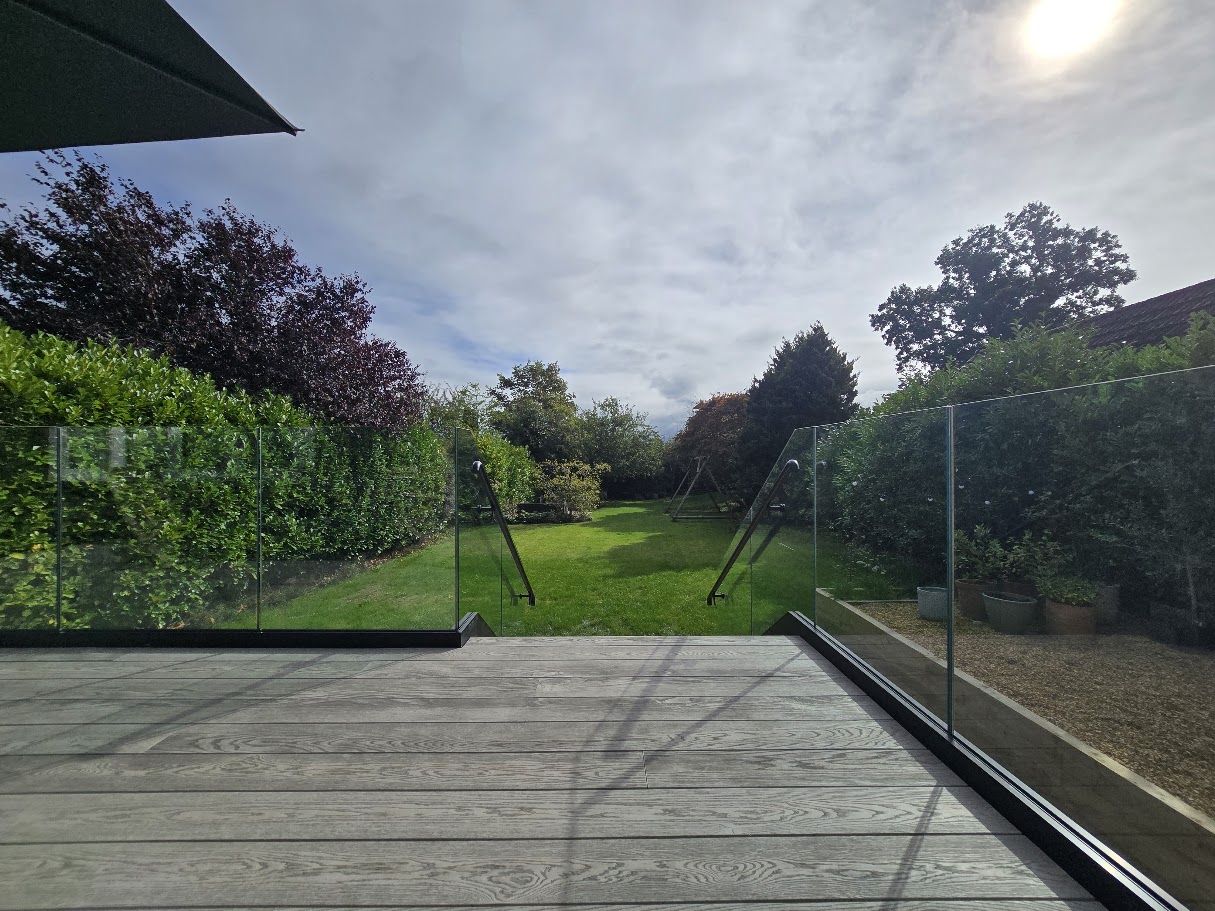 Frameless glass terrace and external staircase — further view of the completed installation