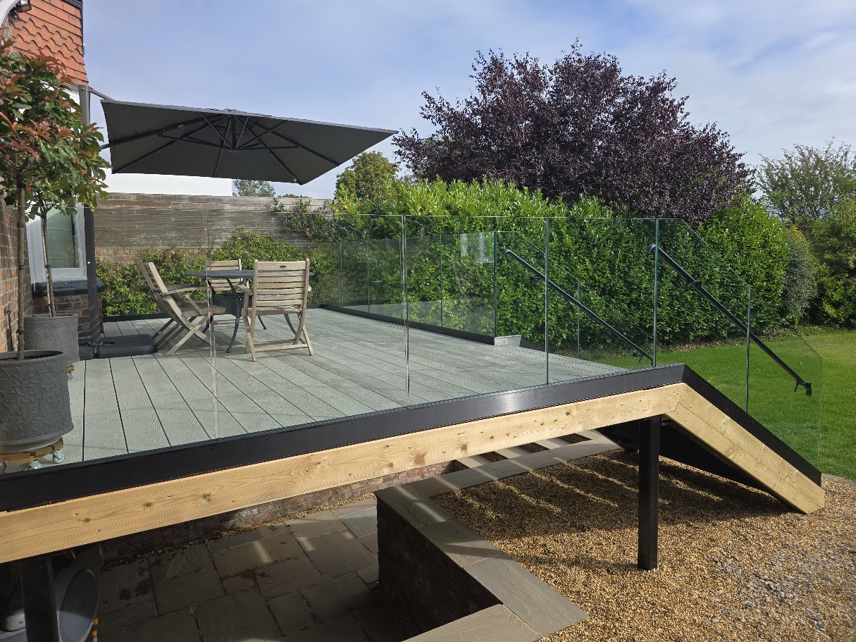 Frameless glass terrace and external staircase — further view of the completed installation