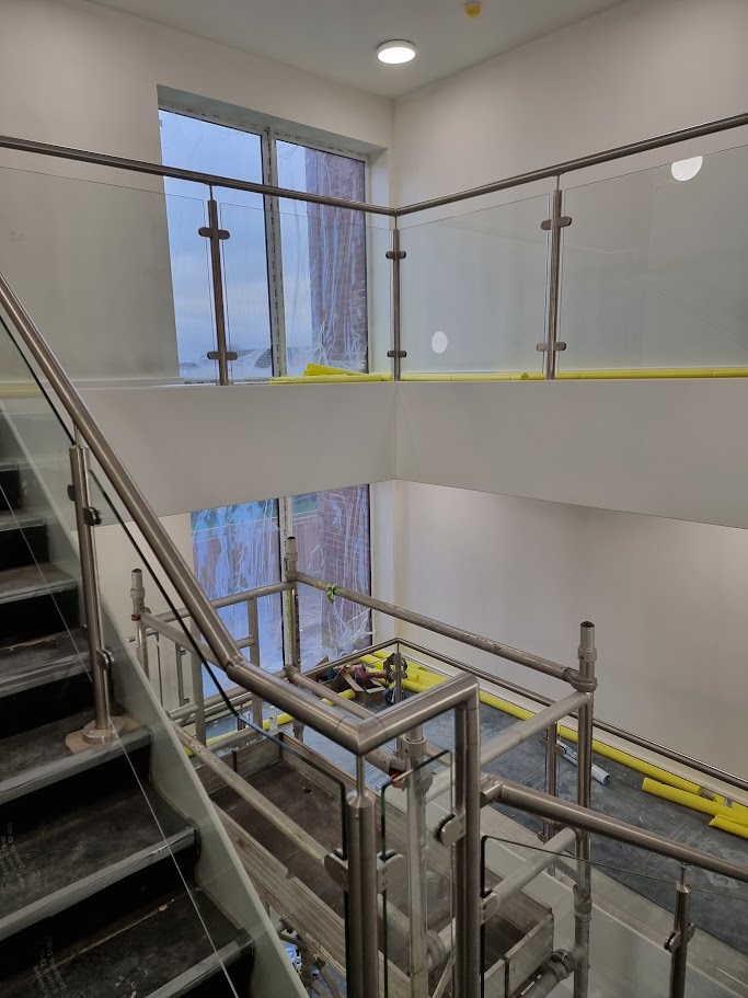 Glass balustrades for a commercial stair and landing — further view of the completed installation