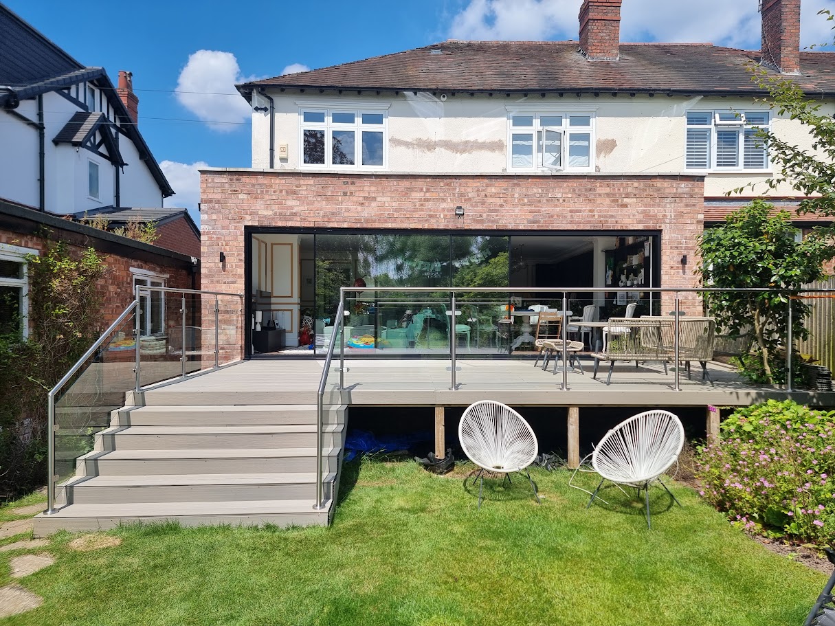 A stainless post glass balustrade on a Hale garden deck — further view of the completed installation