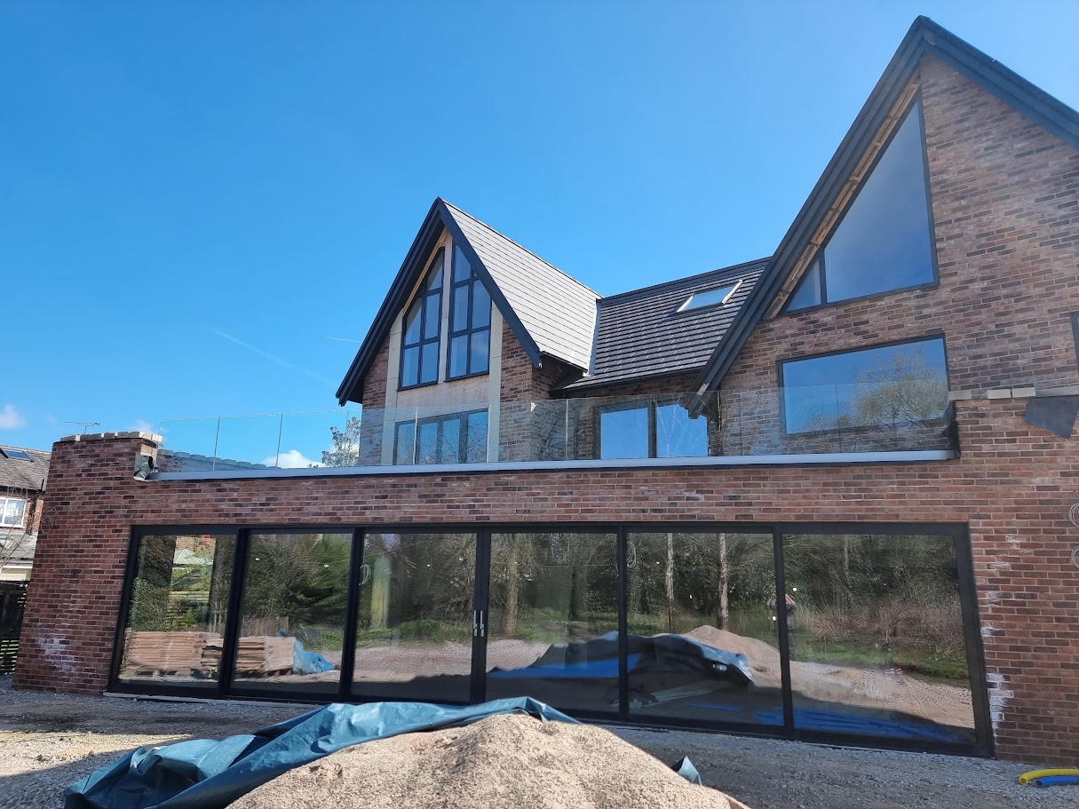 A frameless glass roof terrace in Woodford — further view of the completed installation