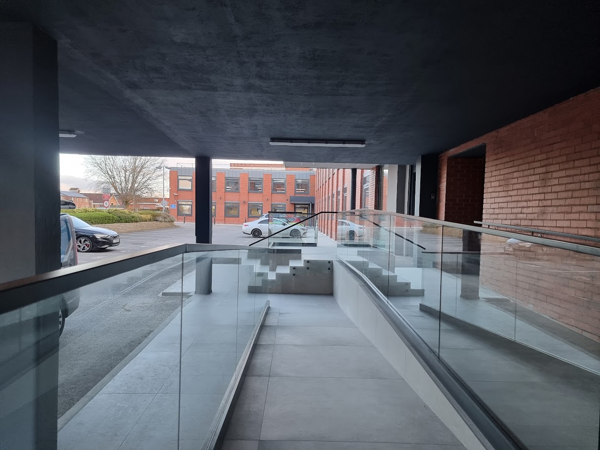 Glass balustrading at the Two Four Nine development, Altrincham — further view of the completed installation