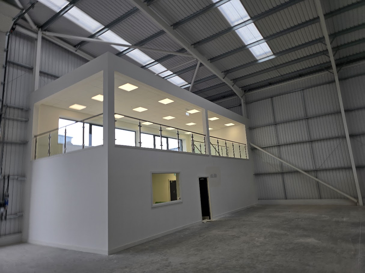 Stainless steel post and glass mezzanine balustrade — Manchester Balustrades installation