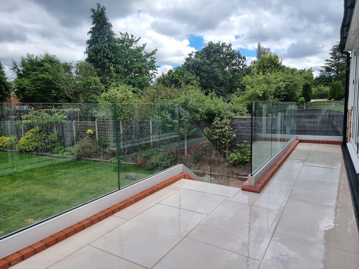 Frameless glass on a raised terrace in Bramhall — further view of the completed installation