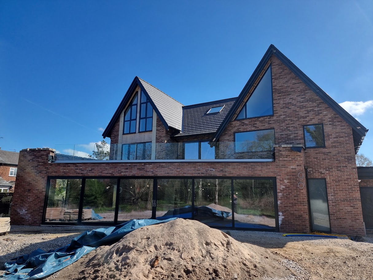 A frameless glass roof terrace in Woodford — Manchester Balustrades installation
