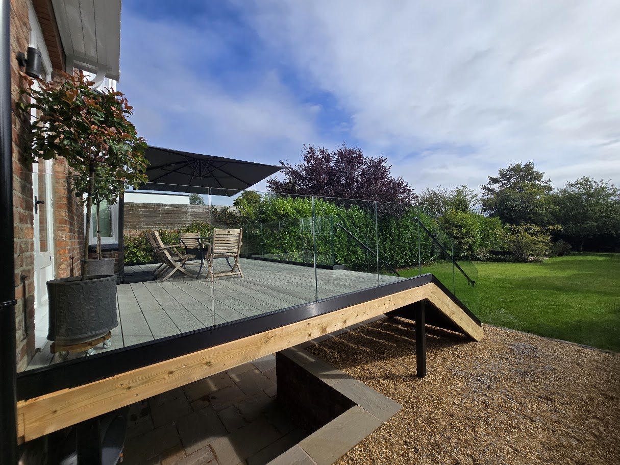 Frameless glass terrace and external staircase — further view of the completed installation