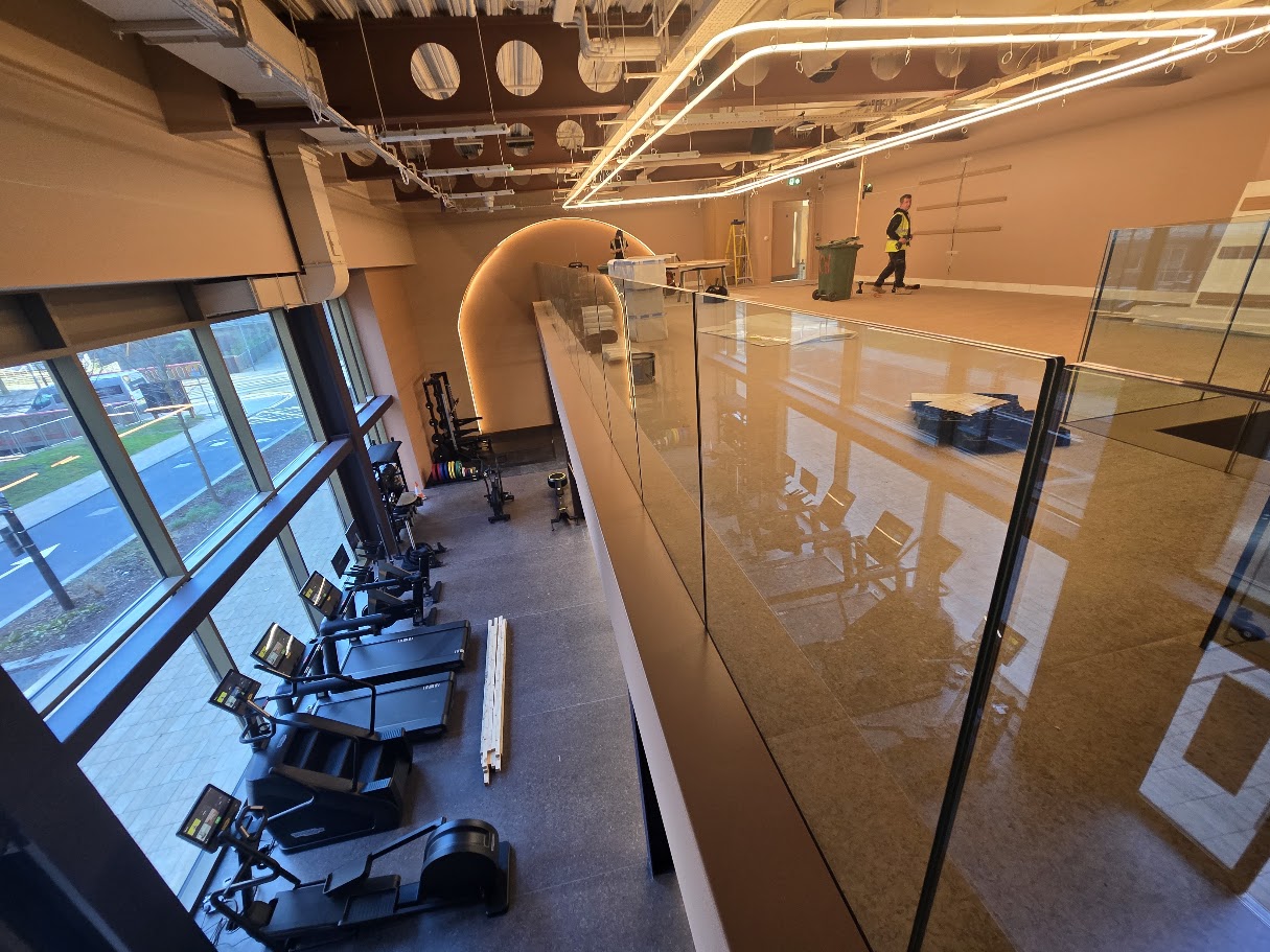 Frameless glass mezzanine and stair balustrades — further view of the completed installation